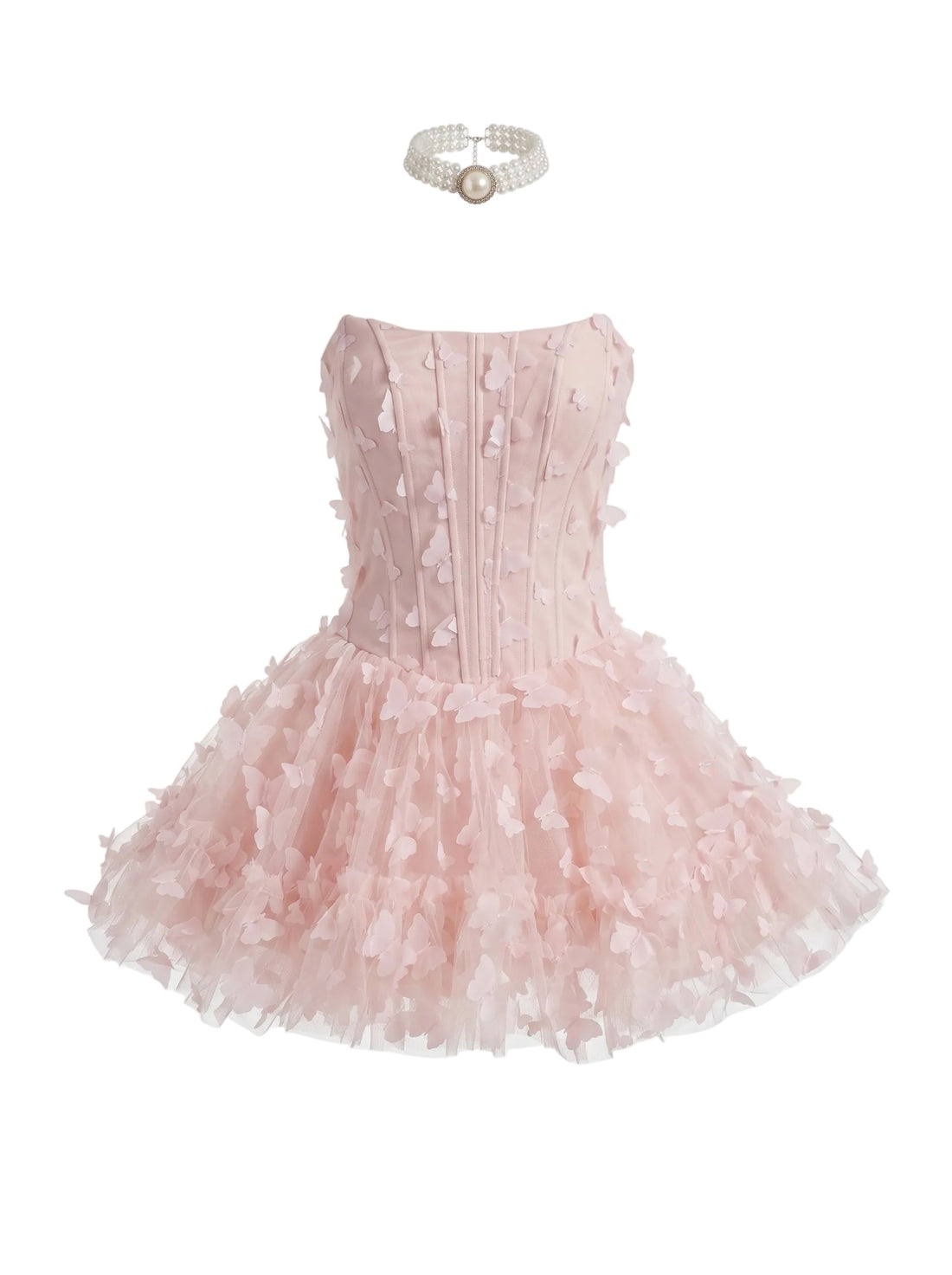 Pink dress with ruffled skirt and matching headband on a white background