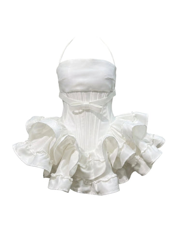 White strapless dress with ruffled skirt on a white background