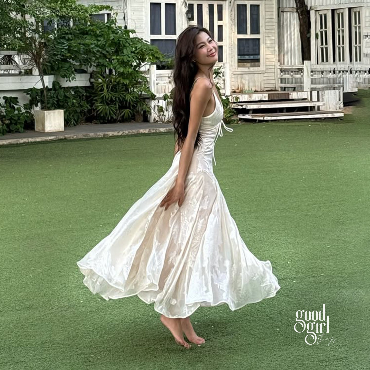 white slip midi dress Hailey Bieber Found the Perfect Vintage for Summer Wear on its own or pair with many of our sheer silk organza pieces White Slip Satin Midi Dress